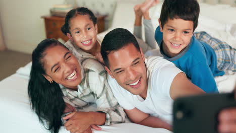 selfie, phone and family together on bed for happy