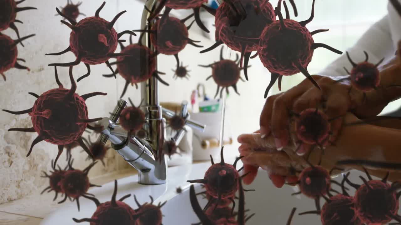 손을  ⁇ 는 부모와 자녀의 손에 퍼지는 거대 코로나바이러스 세포의 애니메이션