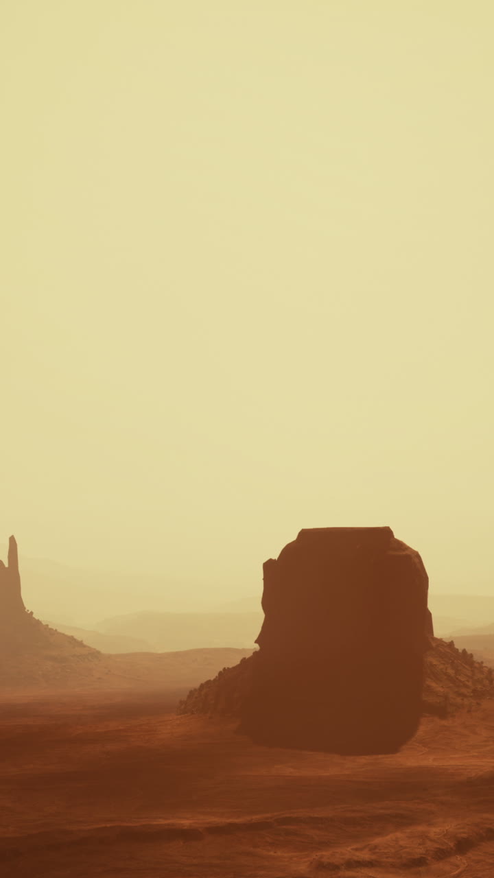 Paesaggio desertico con formazioni rocciose nella Monument Valley