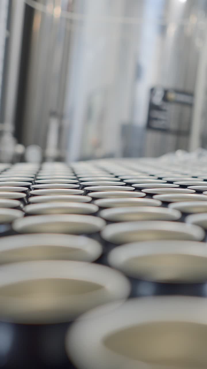 Close-up of Circular Objects on a Production Line in an Industrial Setting