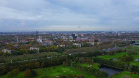 Zoom-in-to-Amsterdam-cityscape-skyline-from-outside-A10-ring-road-at-Amsterdam-Noord