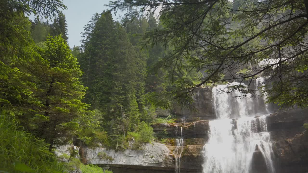 Slow motion camera on waterfall in a nature reserve