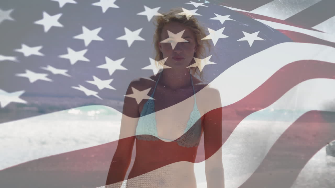 At beach, woman in swimsuit with American flag animation overlaying background