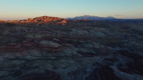 birdseye view of bentonite hills landscape in utah at sunset, usa