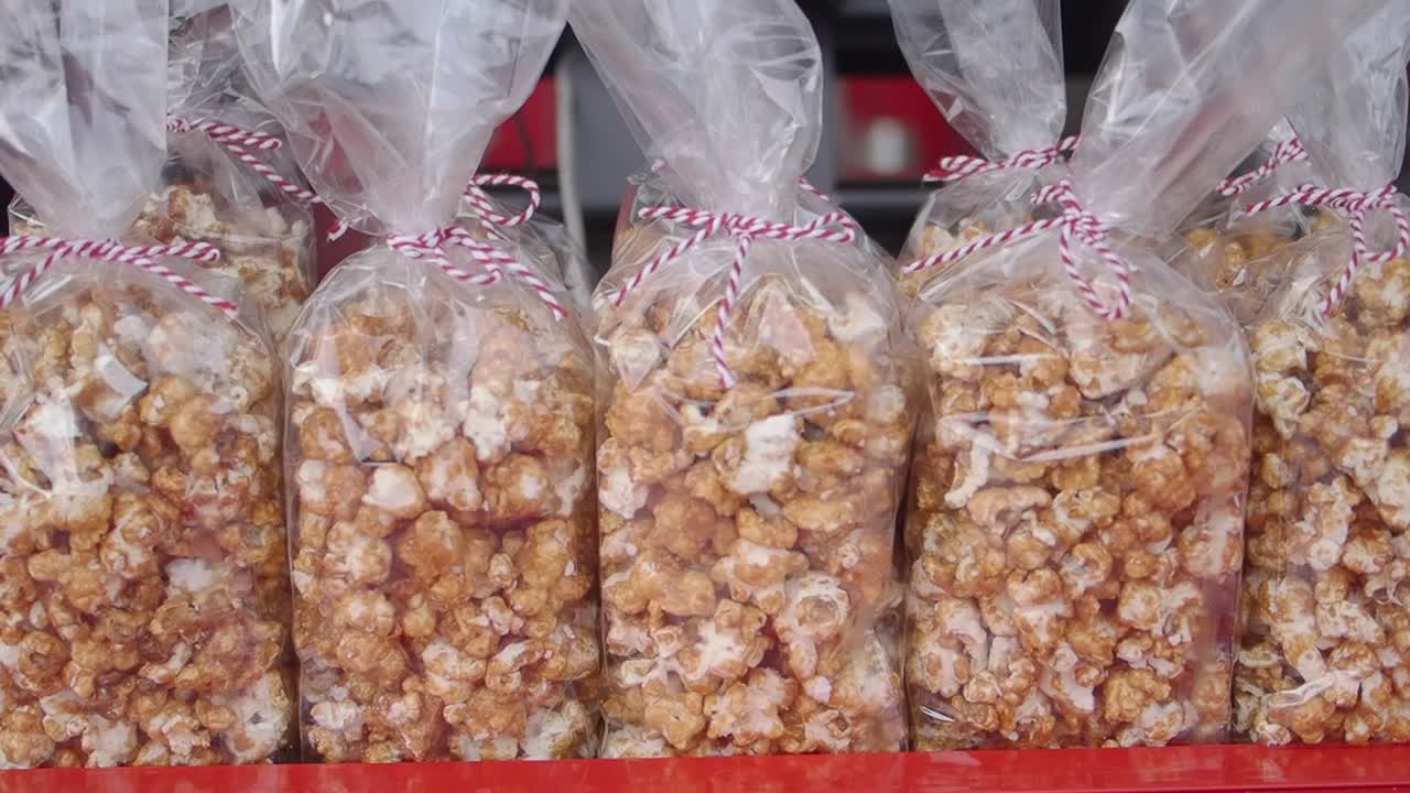Rows of Caramel Popcorn in Clear Plastic Bags