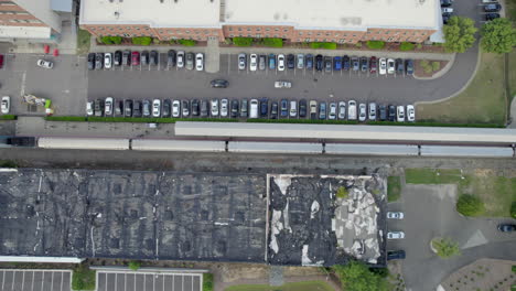 aerial drone over american train station, train depot