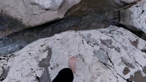 barefoot on a rocky path