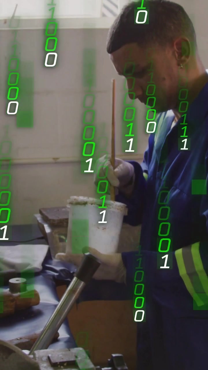 Vertical video: Tech dipping stick, stirring, preparing repair mix while binary overlay expanding