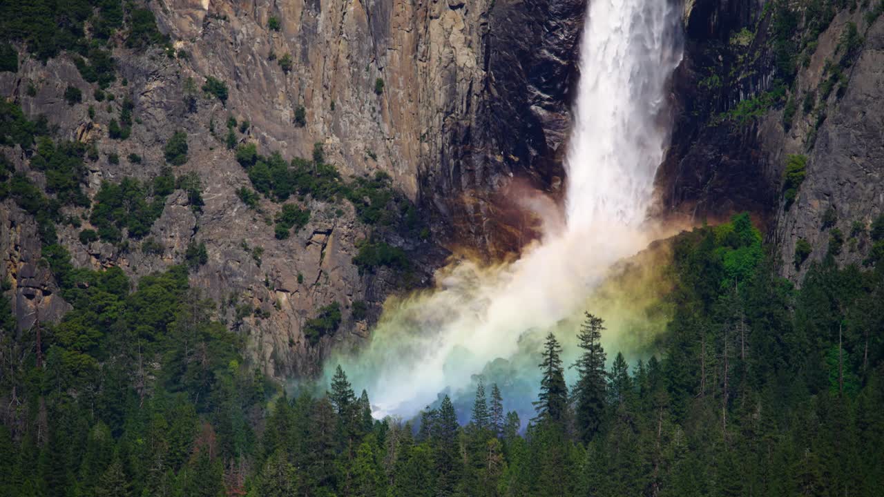 Close up of rainbow in mist base of Bridalveil Fall in Yosemite National Park