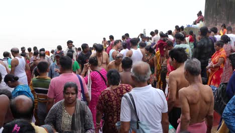 On the eve of Durga Puja, Hindus gather at Ganges for bathing and tarpan on Mahalaya day.