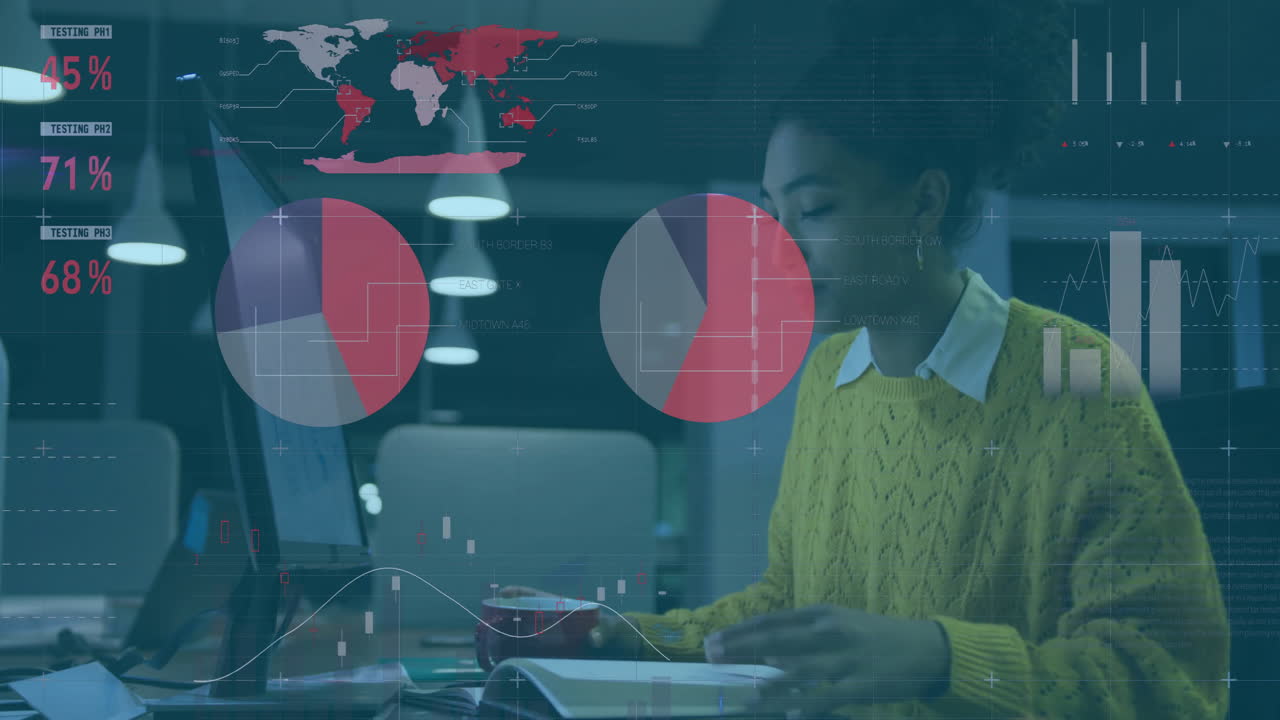 Animation of charts processing data over biracial businesswoman working late at office