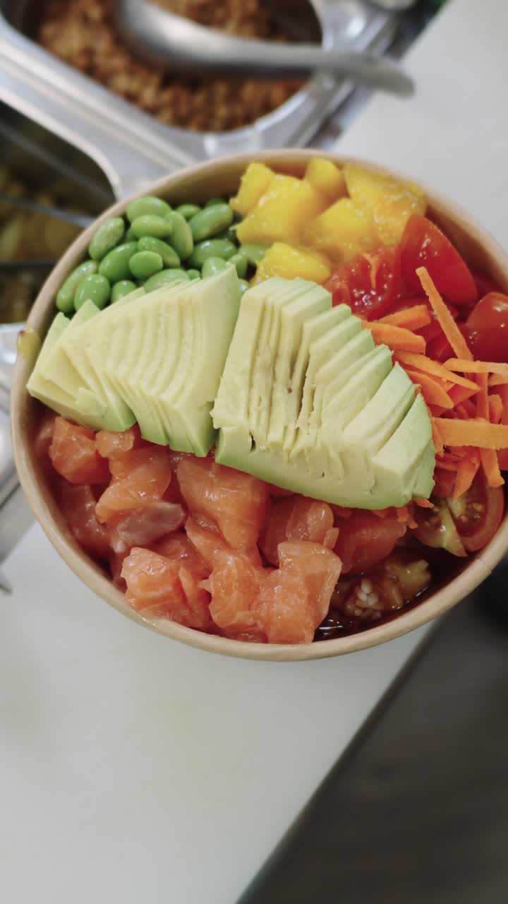 Poke Bowl with Salmon, Avocado and Vegetables