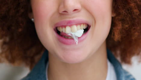 woman blowing bubbles chewing gum candy for fun