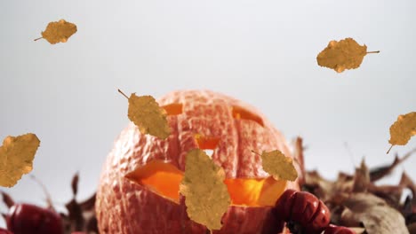 animación de hojas de otoño naranjas que caen sobre la calabaza