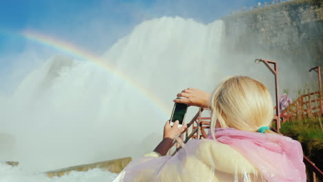 woman photographs niagara falls