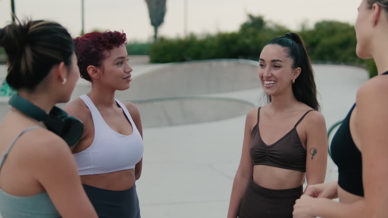 Fitness Friends Share a Laugh After Workout
