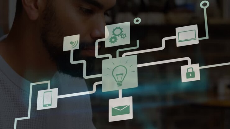 Animation of network of digital icons over african american man using laptop at office