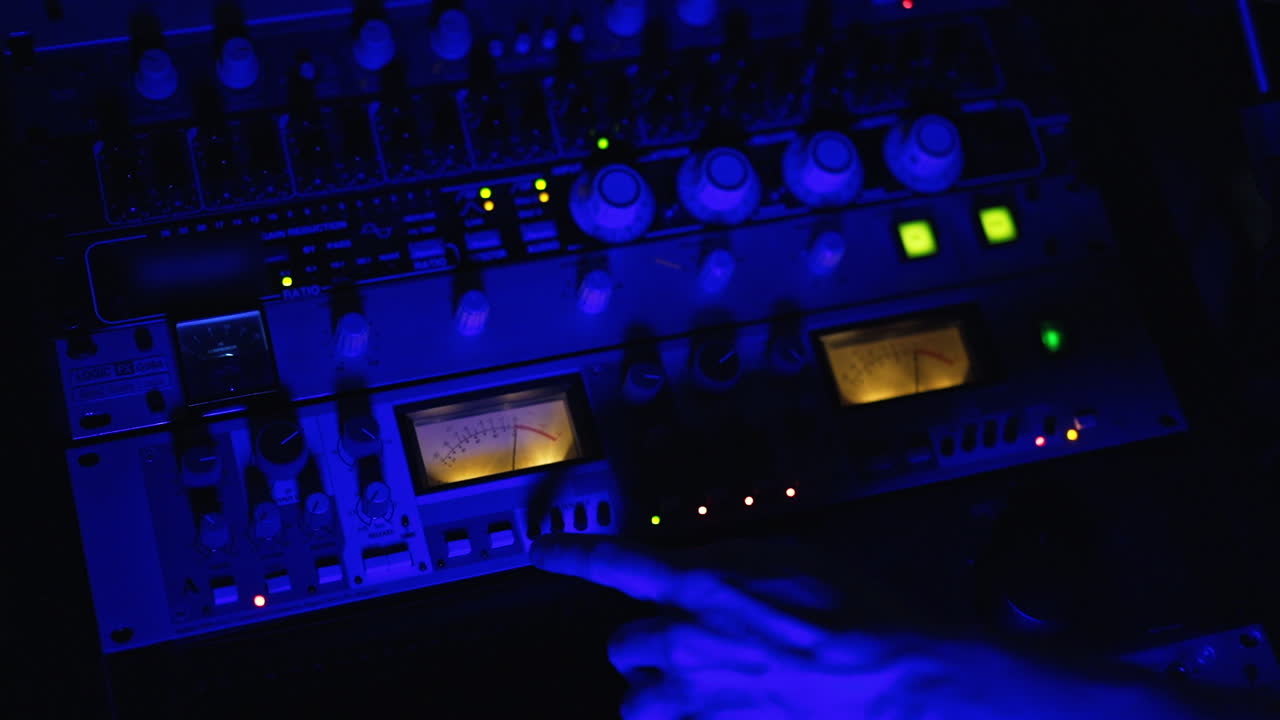 Audio Mixing Console in a Recording Studio at Night