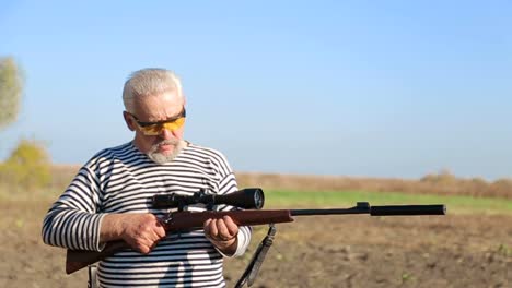 hunter aiming for a rifle a sniper hunter aiming for a rifle a sniper