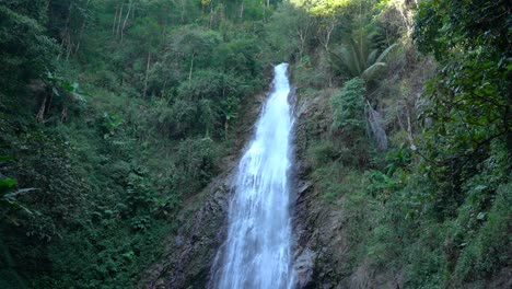 enormous waterfall in jungle mountain near chiang rai, thailand