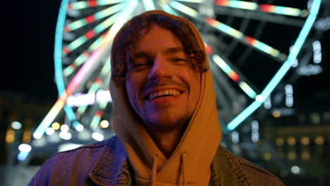 happy man laughing on urban street