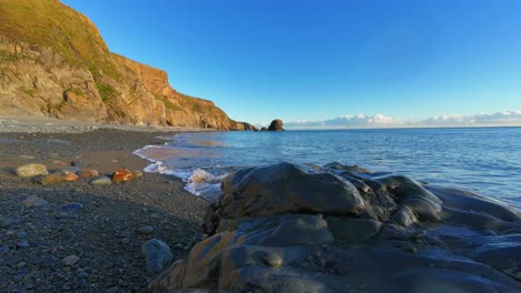 timelapse copper coast waterford waves on beach golden hour clouds out at sea