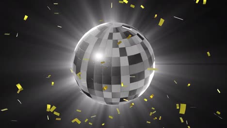 Animation-of-gold-confetti-falling-over-rotating-mirror-ball-on-black-background