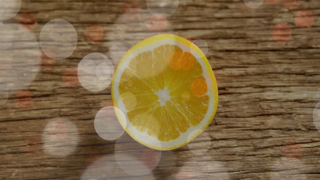 Animation of white spots over slice of lemon