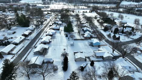 traditional housing in small town america after winter snow storm