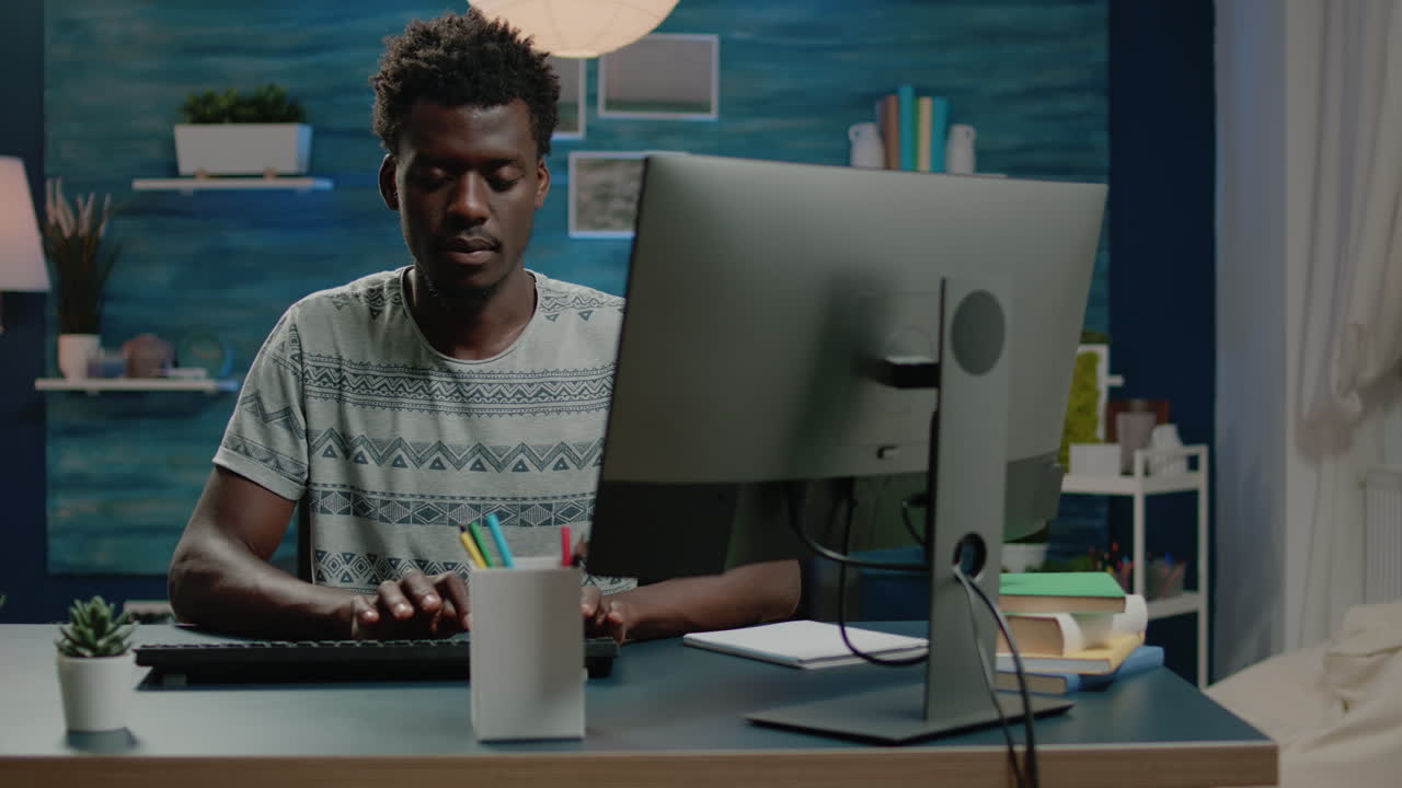 Entrepreneur typing on keyboard and working from home