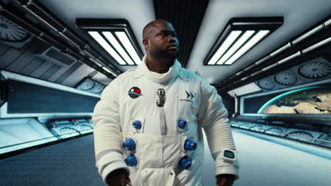 vertical video astronaut walking inside futuristic spacecraft, preparing for scientific mission