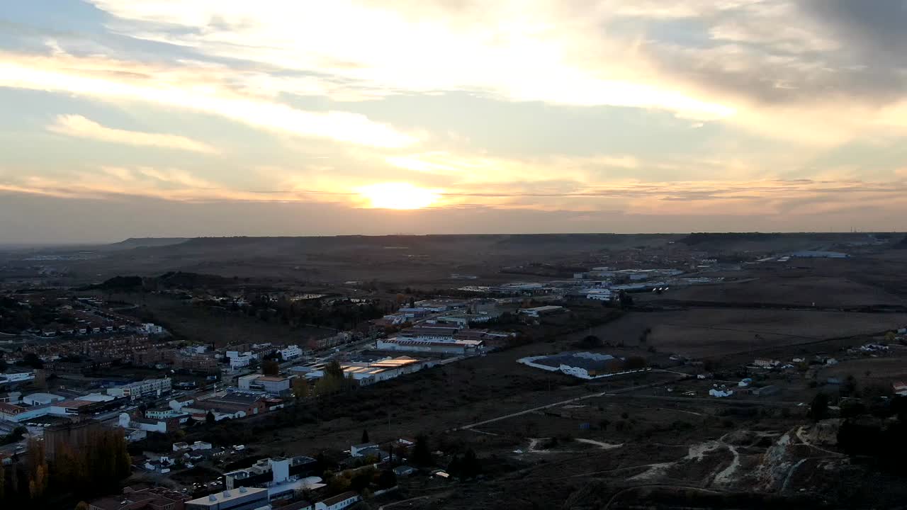 Aerial footage of the outskirts of Valladolid, Spain at sunset