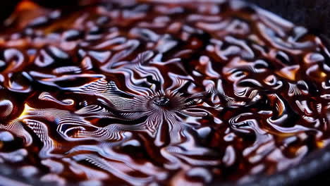 abstract ferrofluid patterns with intricate ripples and reflections