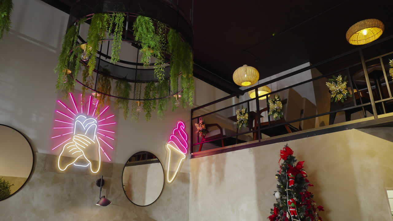 Modern Cafe Interior with Neon Signs and Christmas Decor