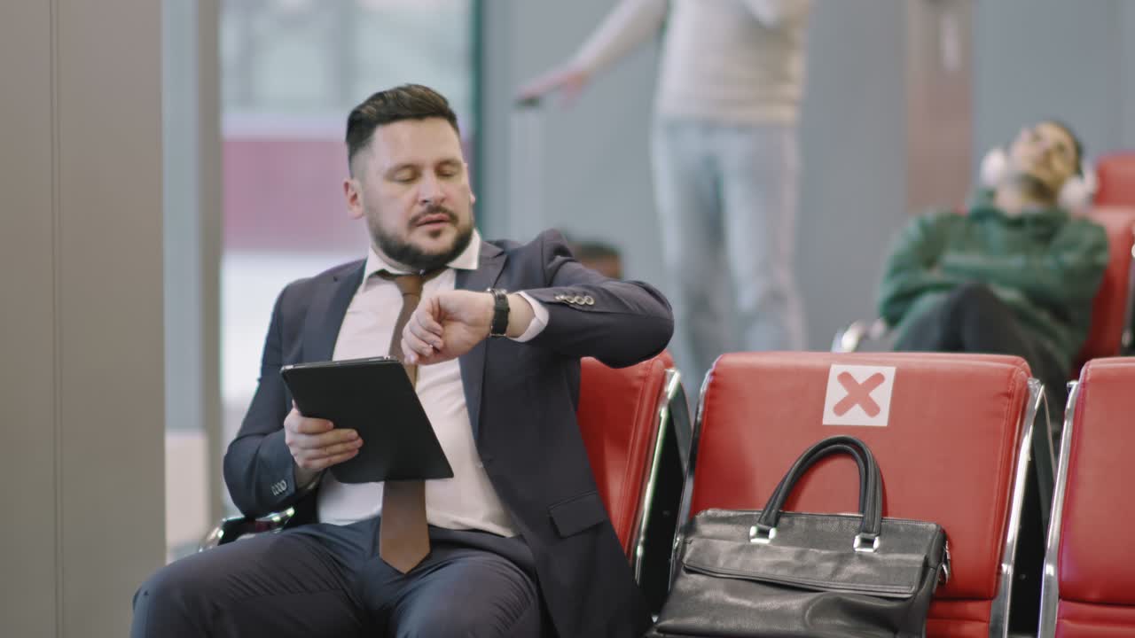 Business Man Waiting For Flight