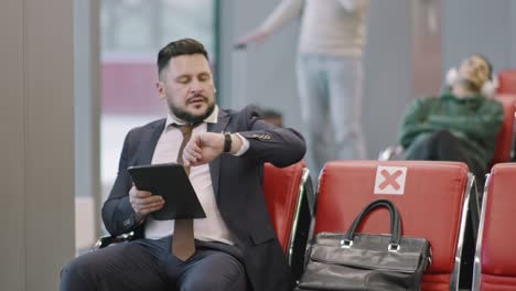 business man waiting for flight