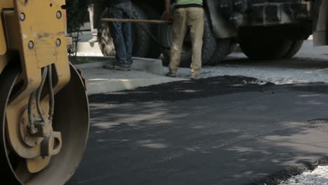 Road rollers building the new asphalt road