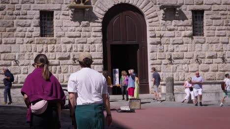 street musician performs in historic italian city square