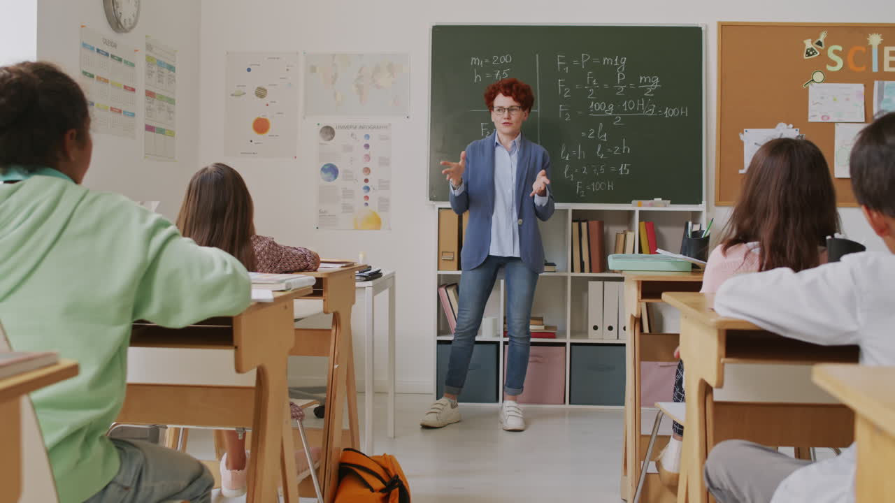 Woman Teaching Math to Kids in Middle School