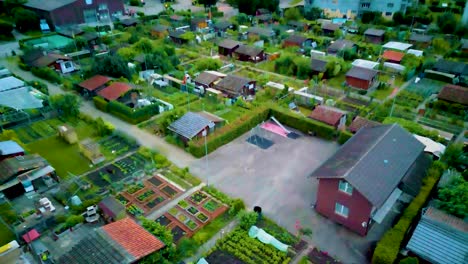 4k drone video of municipal family gardens at the base of mount pilatus in kriens, switzerland on a summer evening