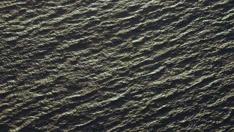 abstract view of waves rolling in sunset glow at cape of good hope