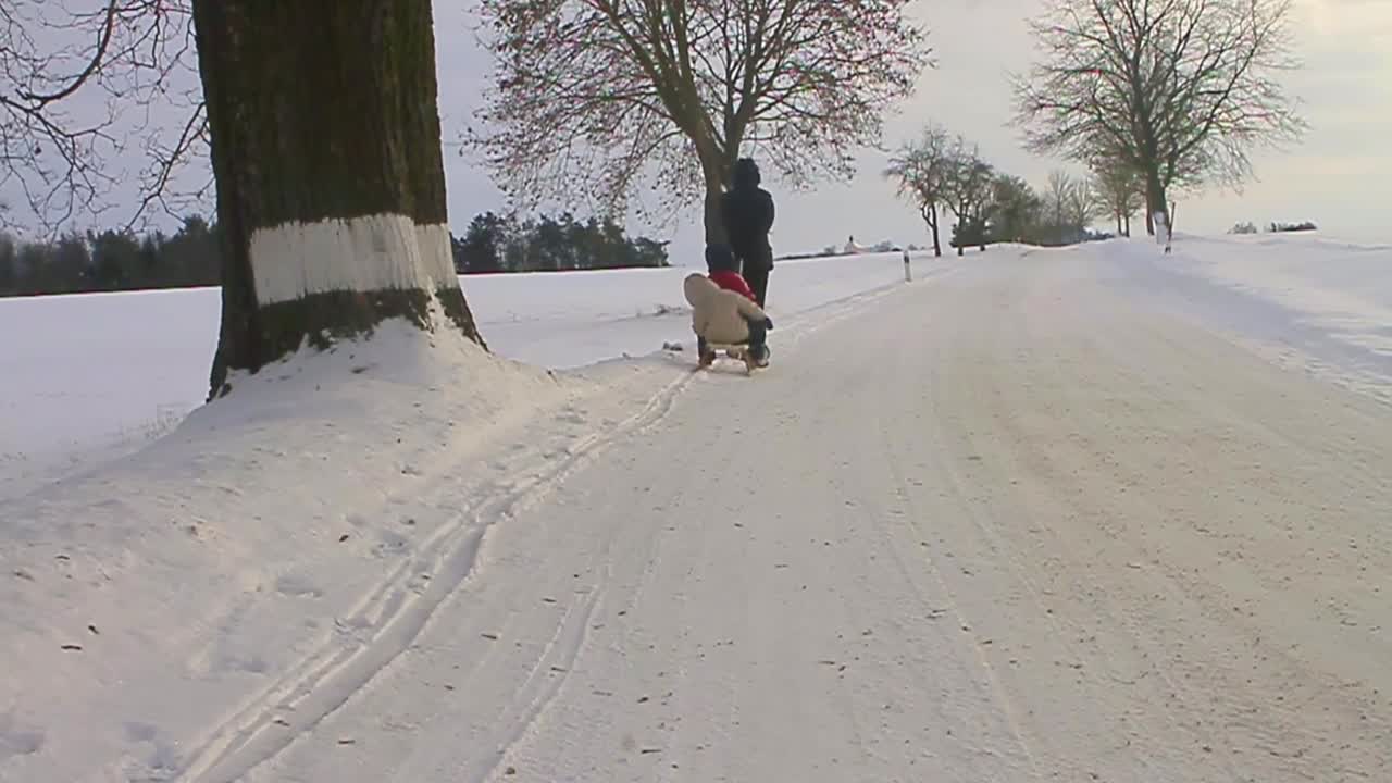 Sledge being pulled through the snow stock video stock footage