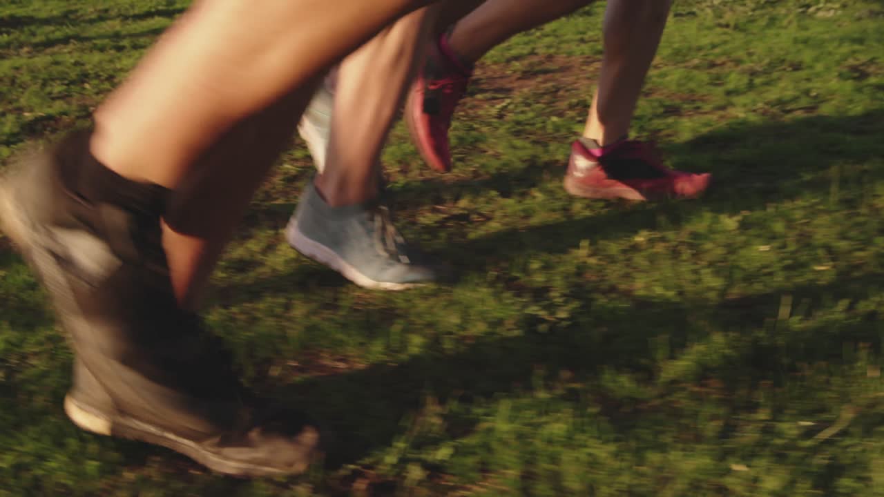 Young adults training at an outdoor gym bootcamp