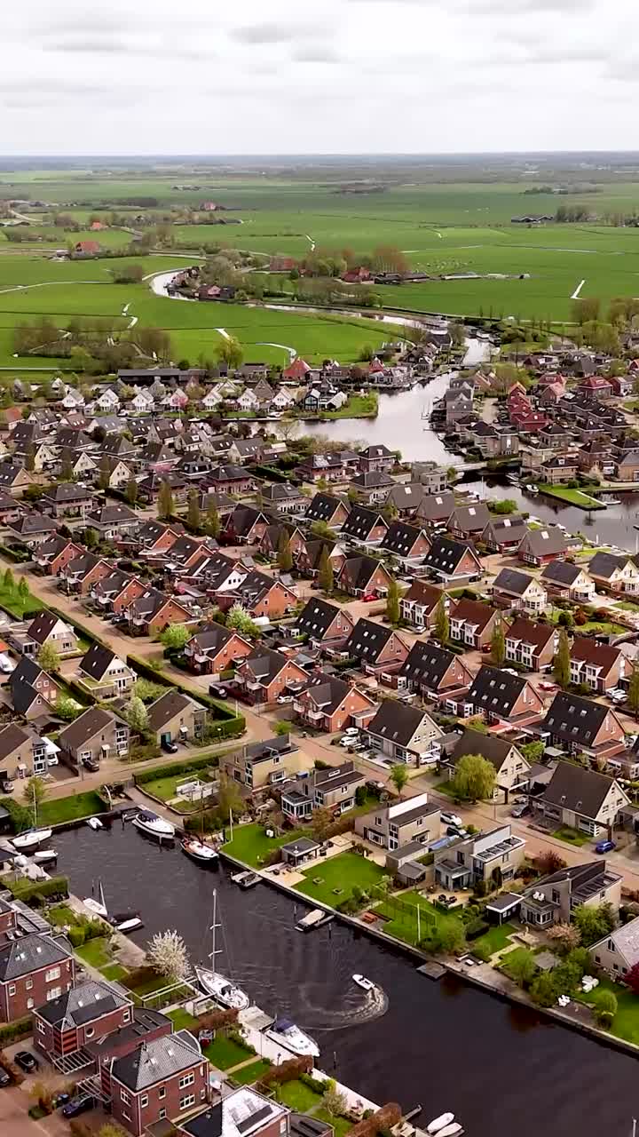 Aerial view of a Dutch village with canals and houses