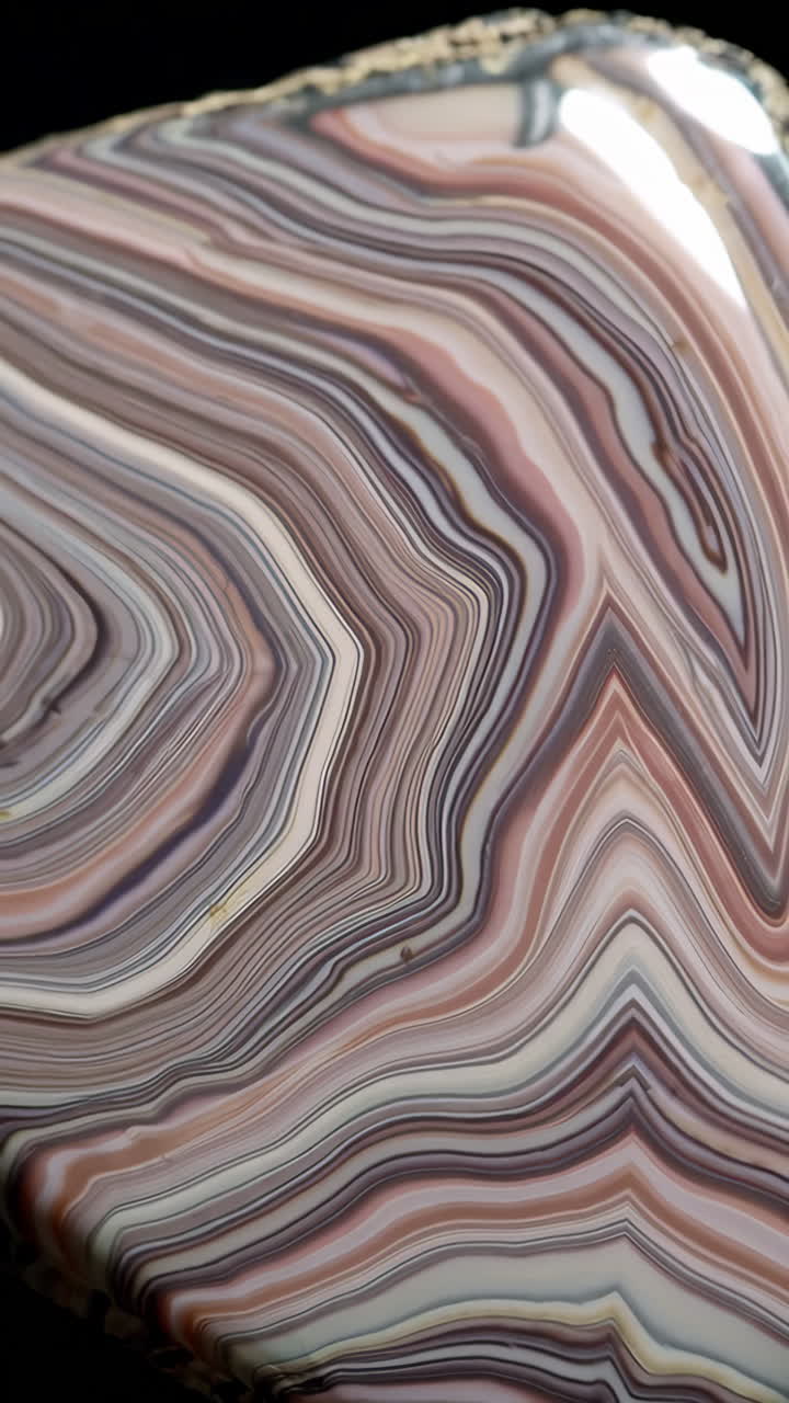 Close-up of Natural Agate Stone with Wavy Layered Patterns