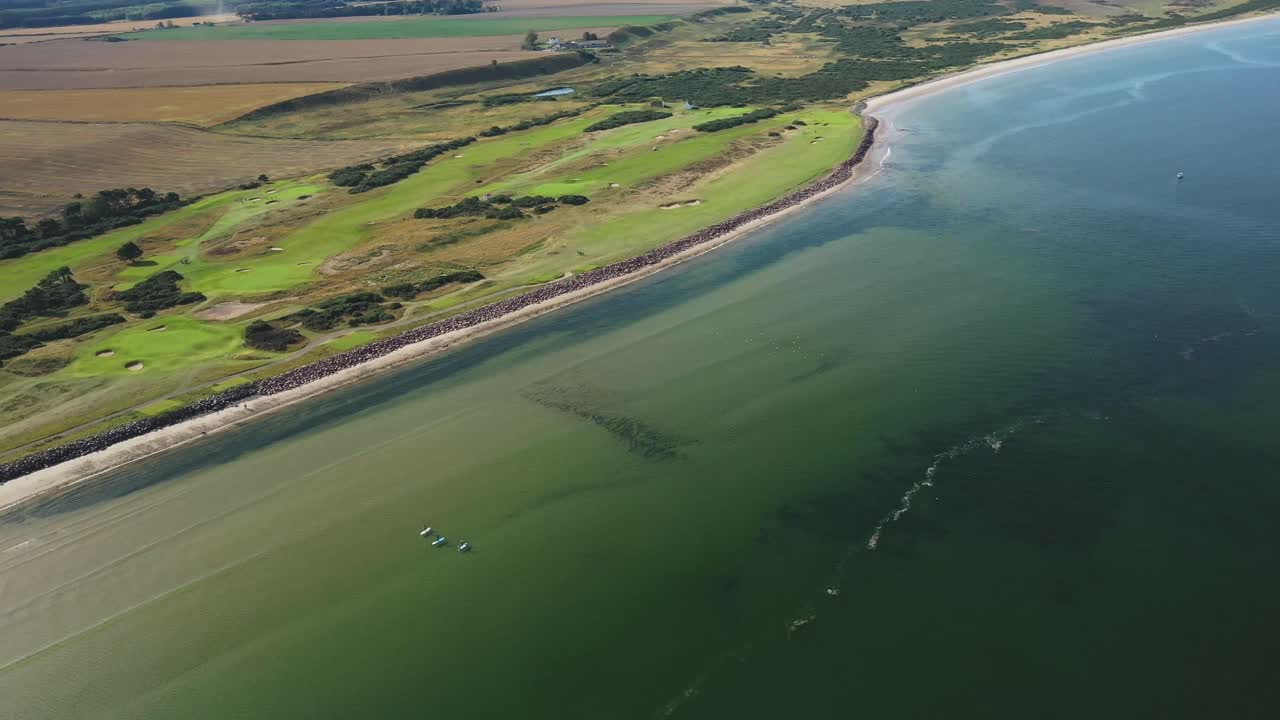 Aerial View of a Coastal Golf Course and Beach