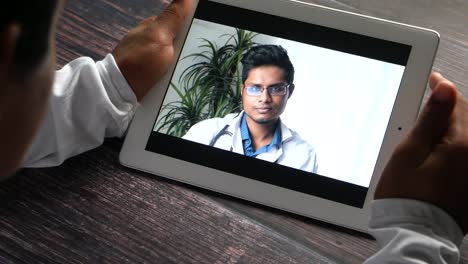 doctor-patient video consultation on tablet