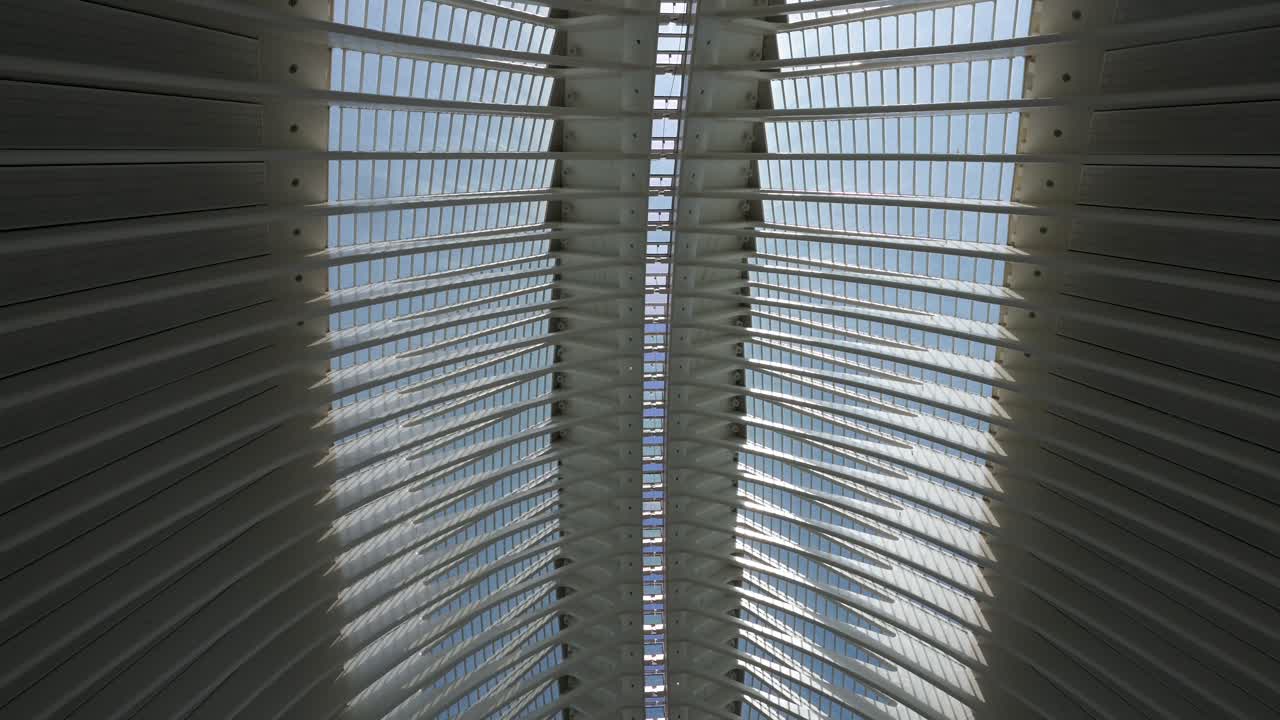 Looking up from within the Agora (CaixaForum Valencia) building at the City of Arts and Sciences complex in Valencia. It is the city's most important tourist destination in Spain.