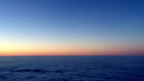 sunrise and clouds, view from a plane