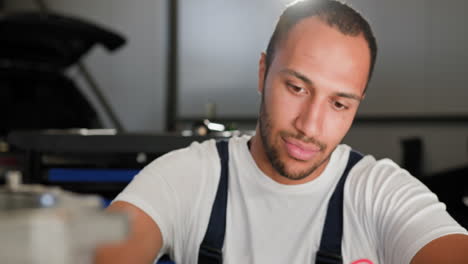 technician performing electrical tests on circuit board